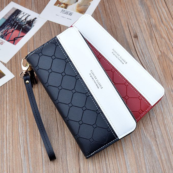 "Forever Young Women’s Long Clutch in Black, Red, Green, Pink, and Blue. The clutch features a sleek, stylish design with a spacious interior and a built-in cardholder, ideal for organizing essentials and adding elegance to any outfit."