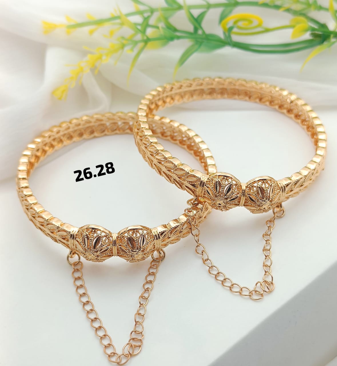"Luxury gold-plated chain bangles featuring a premium, elegant design suitable for any occasion. The stylish and high-quality finish adds sophistication to your outfit."