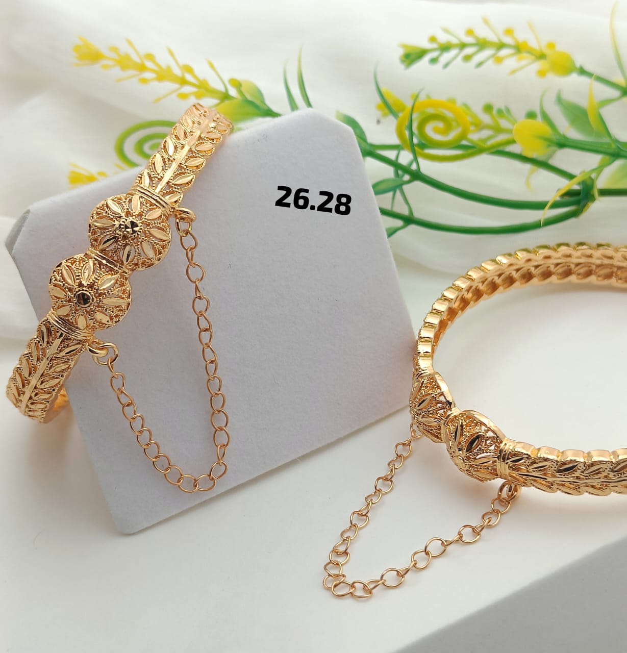 "Luxury gold-plated chain bangles featuring a premium, elegant design suitable for any occasion. The stylish and high-quality finish adds sophistication to your outfit."