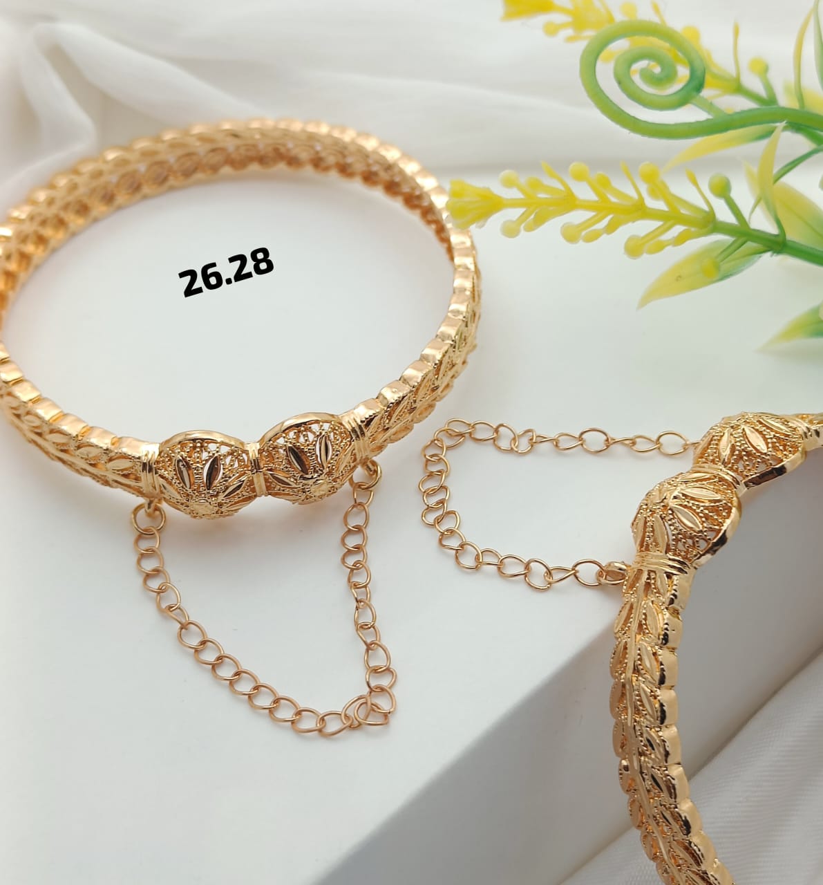 "Luxury gold-plated chain bangles featuring a premium, elegant design suitable for any occasion. The stylish and high-quality finish adds sophistication to your outfit."