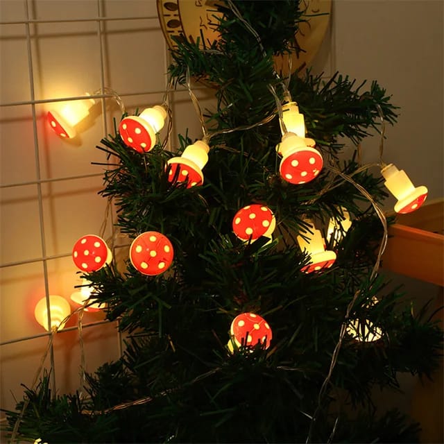 "Enchanting Mushroom String Lights featuring 10 LED lights per string, showcasing a warm and soft glow. Versatile design allows for battery and USB power options, perfect for indoor and outdoor decoration. Ideal for creating a magical ambiance at parties or cozy evenings."